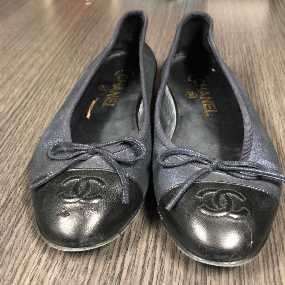 Navy and black Chanel flats
